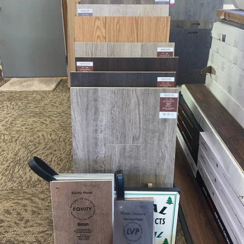 Luxury Vinyl Plank samples at Carpet Barn LLC's showroom in Demotte, IN